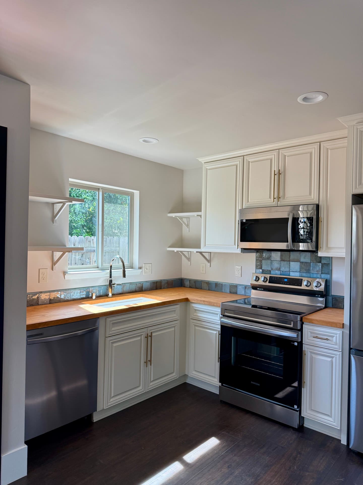 Roseville detached ADU — kitchen with butcher block counters — gallery thumbnail 5