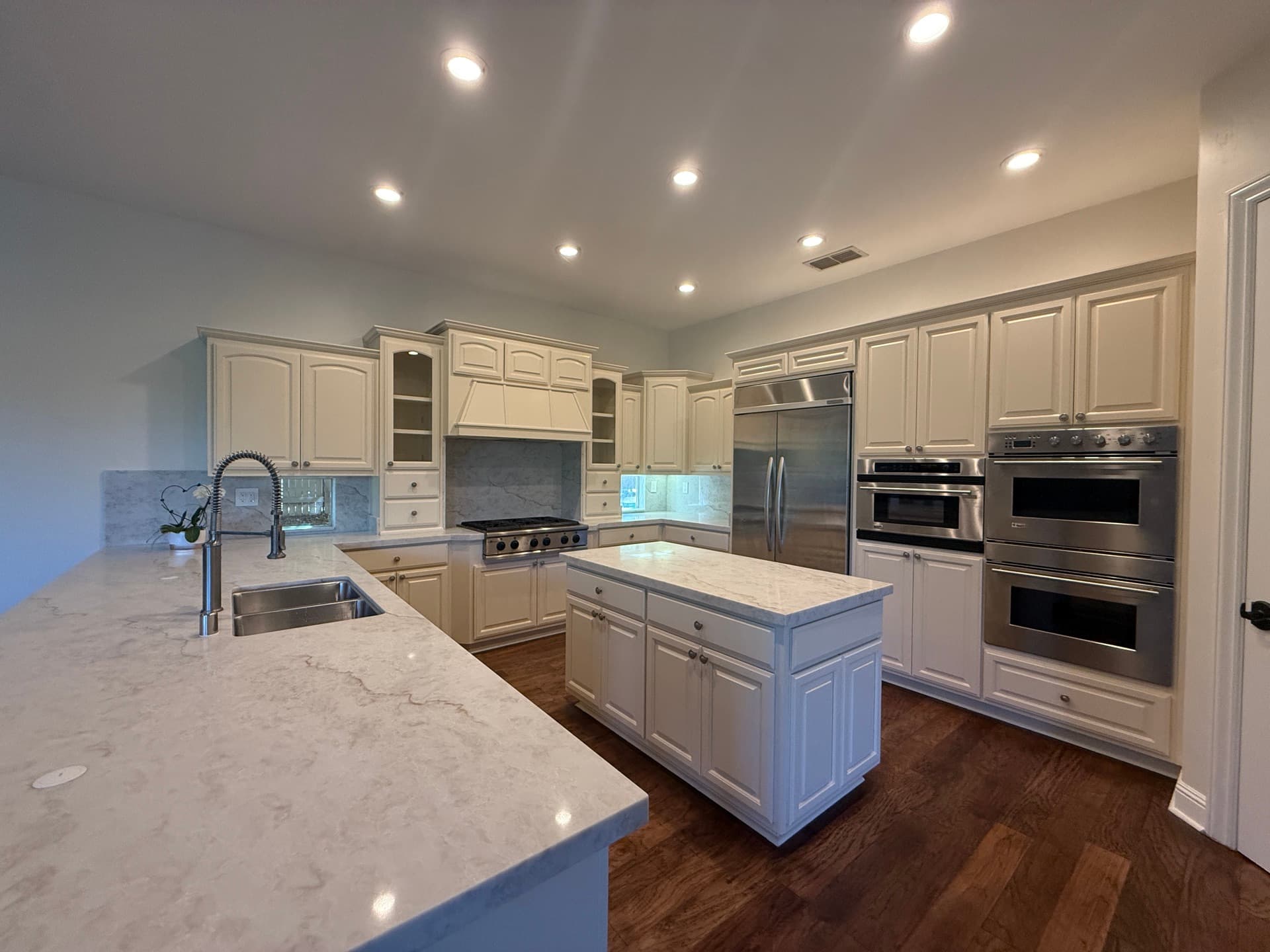 Custom kitchen island with quartz countertop and bar seating in an El Dorado Hills remodel
