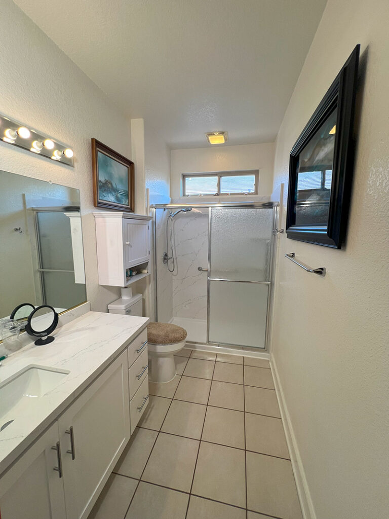 New bathroom vanity installion for a bathroom remodel - Future Generation Construction