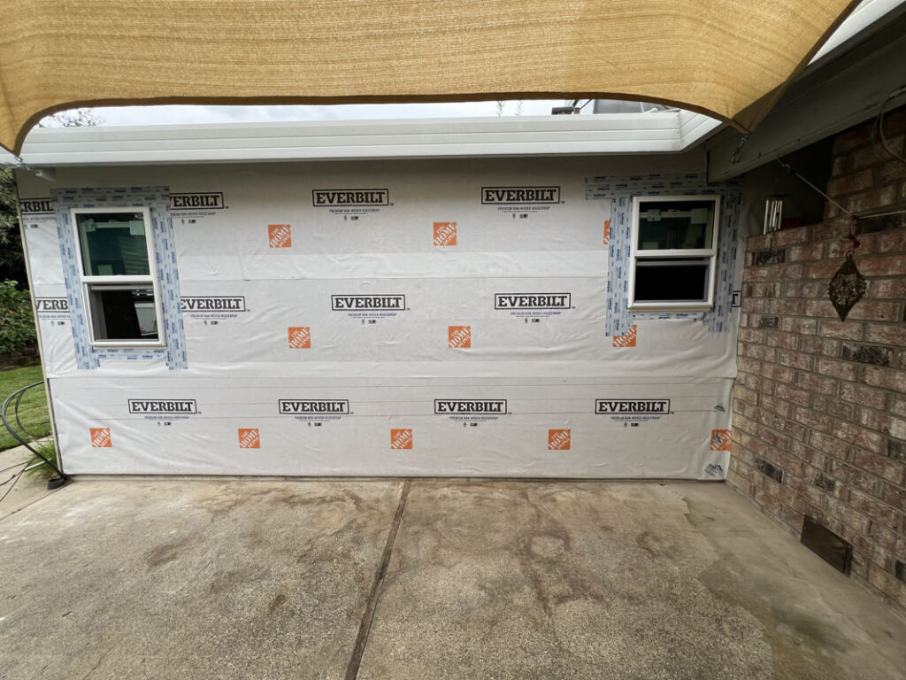 Preparation to install the new siding on a home remodeling project with Future Generation Construction